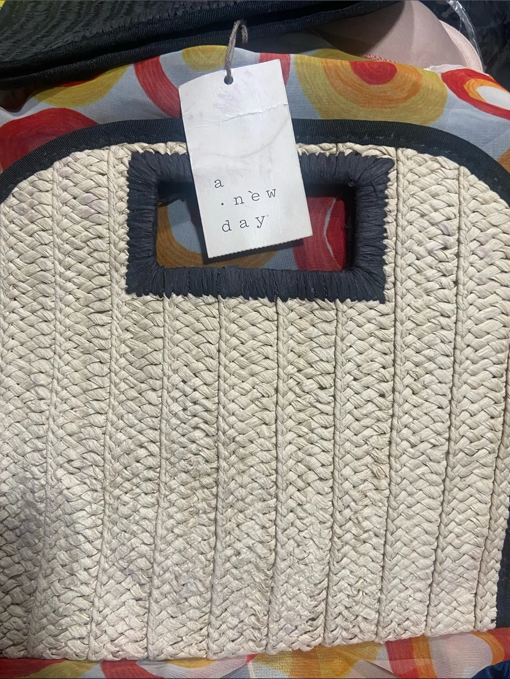 A new day Neutral Woven Straw Clutch with Black Trim